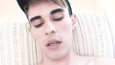 Cute twink is playing with his piston in front of the camera