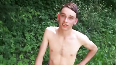 Skinny European chap is posing naked out in the open