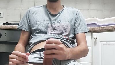 Amateur teen is jerking his huge dong in front of the phone
