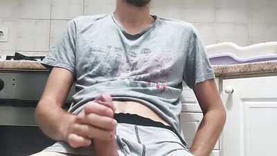 Amateur teen is jerking his huge dong in front of the phone