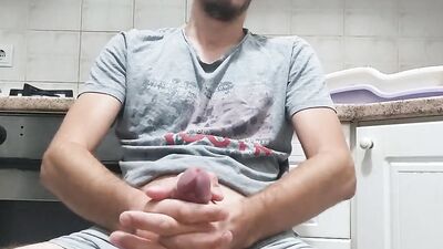 Amateur teen is jerking his huge dong in front of the phone