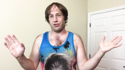 Adam Castle is flashing his arm pit in front of the camera