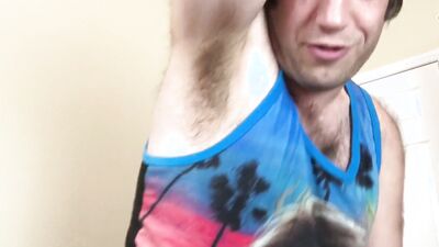 Adam Castle is flashing his arm pit in front of the camera