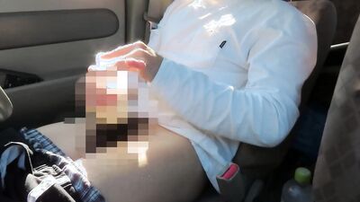 Amateur Japanese bloke is stroking his cock while driving a van