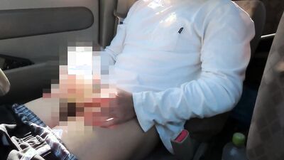 Amateur Japanese bloke is stroking his cock while driving a van