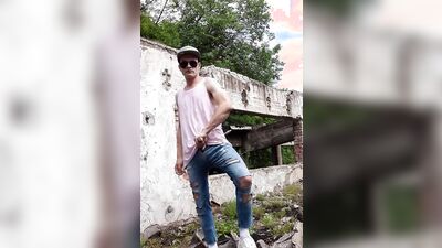 Skinny amateur chap is jerking his prick out in the open