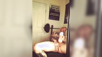 Amateur tattooed dude is flashing his ass after the workout