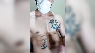 Amateur masked bloke is playing with his hard pecker in this solo video