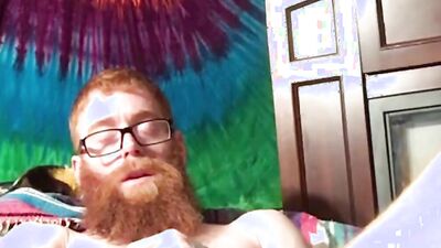 Ginger chap is jerking off in front of the phone