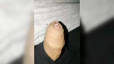Close-up homemade video of a chap stroking his hard prick