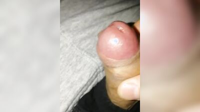 Close-up homemade video of a chap stroking his hard prick