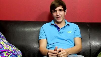 Skinny gay chap is jerking off in front of the phone