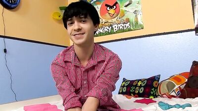 Pretty college dude is flashing his ass inside the dormitory room