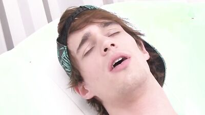 Horny college dude is jerking his hard prick in a solo performance