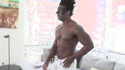 Beefed dude gets his BBC stroked on the couch by a roommate
