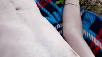 Russian dude is playing with his gummy toy out in the open