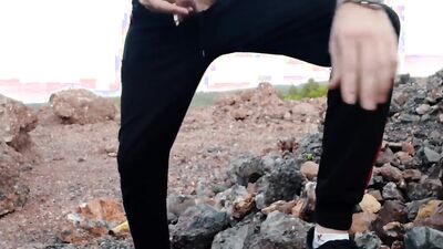 Horny Russian bloke plays with a gummy puss out in the open