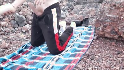 Horny Russian bloke plays with a gummy puss out in the open