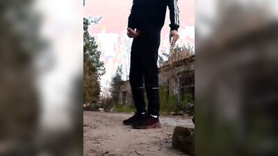 Perverted Russian bloke is jerking off out in the open