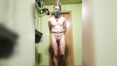 Tied-up lad is posing in front of the camera