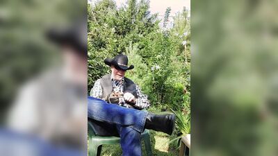 Perverted cowboy is stroking his willy in this solo performance