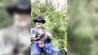 Perverted cowboy is stroking his willy in this solo performance