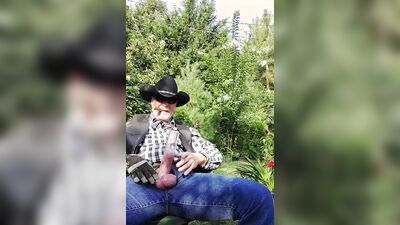 Perverted cowboy is stroking his willy in this solo performance