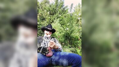 Perverted cowboy is stroking his willy in this solo performance