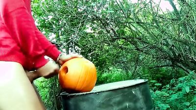 Amateur twink is shoving his hard prick into a pumpkin