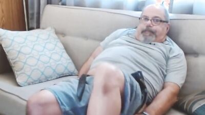 Chubby stepdad is jerking his pecker in front of the camera