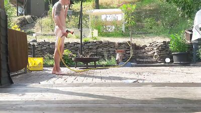 Horny chap is playing with his pecker while taking a shower
