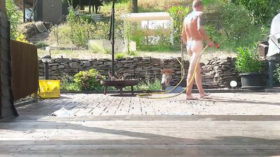 Horny chap is playing with his pecker while taking a shower