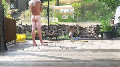 Horny chap is playing with his pecker while taking a shower