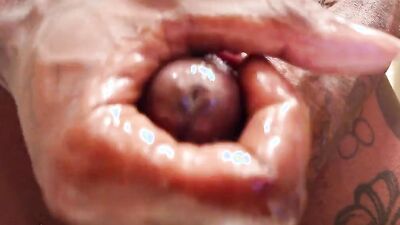 Close-up video of African bloke stroking his huge dong