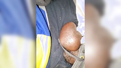 Close-up video of a chap stroking his prick while wearing a gloves