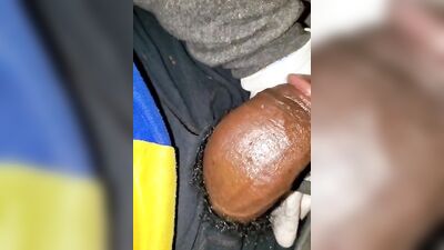 Close-up video of a chap stroking his prick while wearing a gloves