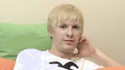 Blonde twink is jerking his phallus in front of the camera