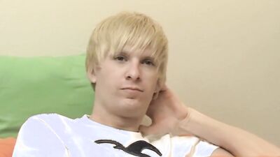 Blonde twink is jerking his phallus in front of the camera