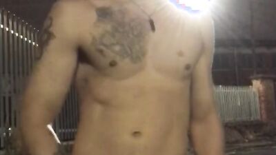 Naked fella is jerking his big johnson out in the open