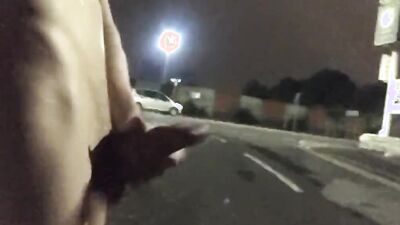 Naked fella is jerking his big johnson out in the open