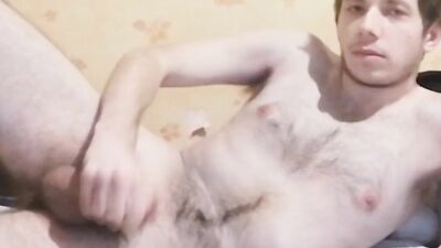 Amateur fella strokes his cock in front of the camera
