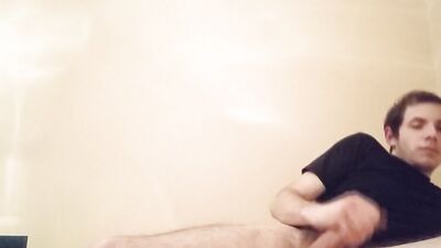 Dude is stroking his dick in front of the camera