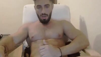 Straight fella is stroking cock in front of the camera