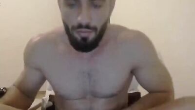 Straight fella is stroking cock in front of the camera