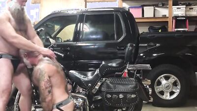 Fellow is getting fucked on his bike by a horny bear