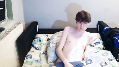 Cute amateur twink films himself while jerking off in the bedroom