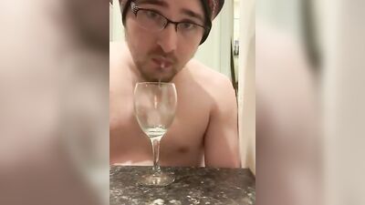 Perverted bloke is spitting inside the glass in this solo performance