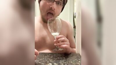 Perverted bloke is spitting inside the glass in this solo performance