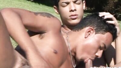 Two good looking Latinos are fornicating out in the open