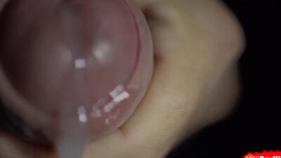 Close-up footage of a chap stroking his hard piston